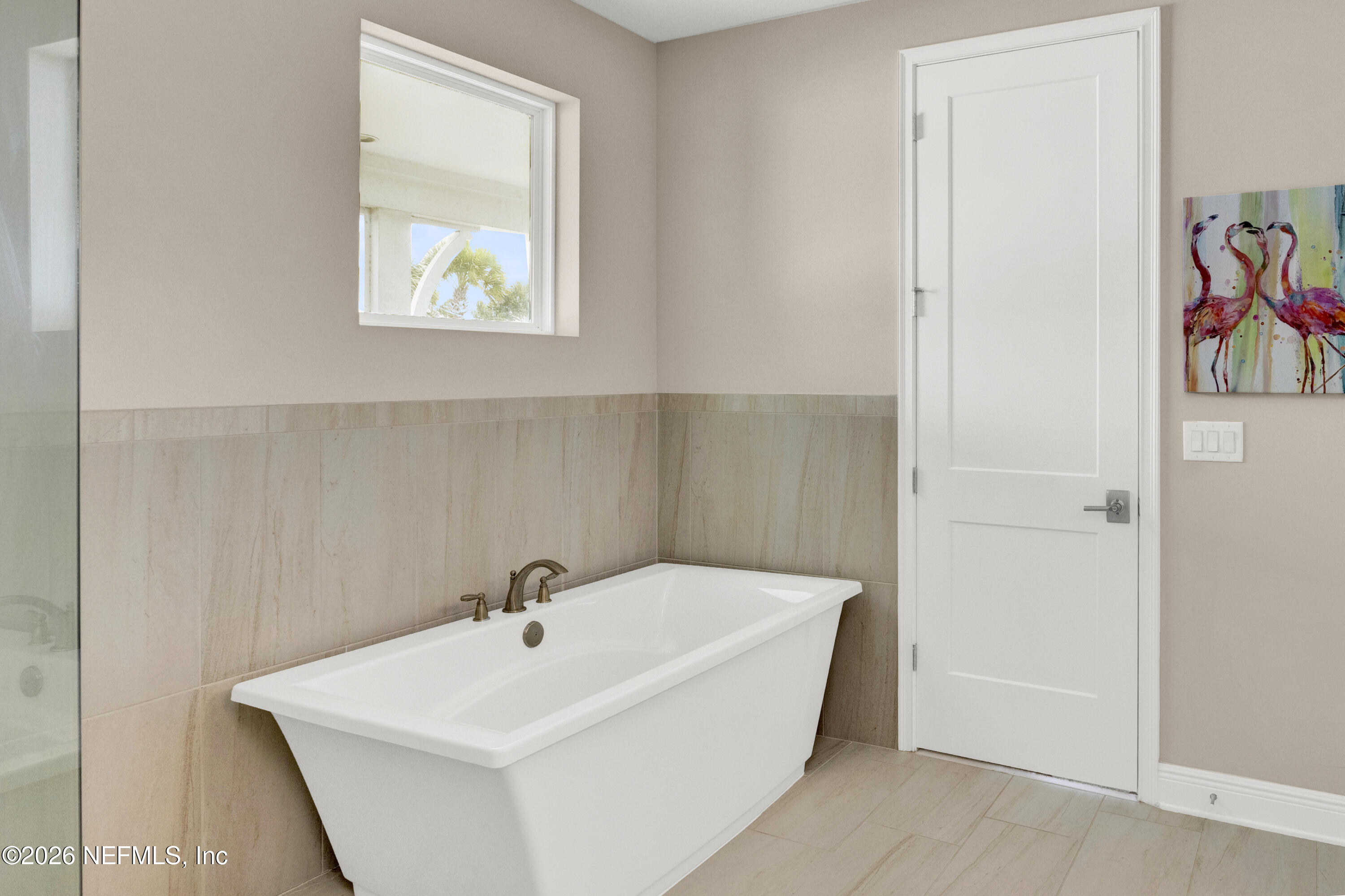 247 Rum Runner Way St. Johns, FL 32259 - Photo 22 of 42 a white bath tub sitting next to a white sink