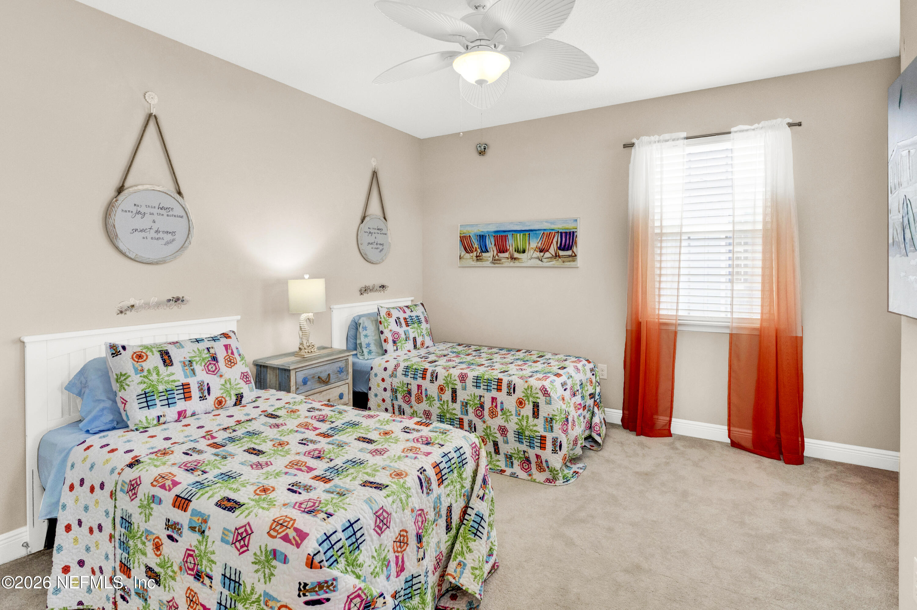 247 Rum Runner Way St. Johns, FL 32259 - Photo 25 of 42 a bedroom with bed and a chandelier