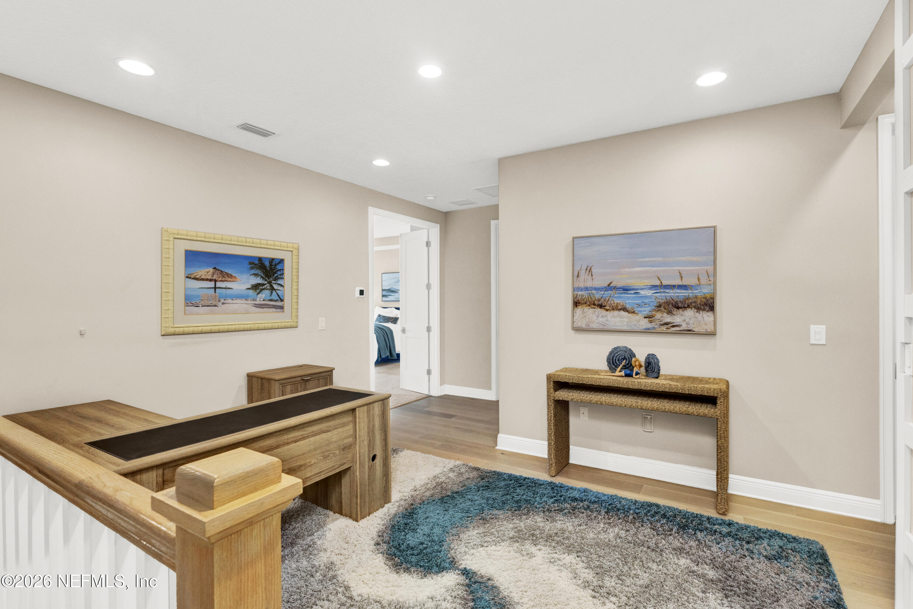 247 Rum Runner Way St. Johns, FL 32259 - Photo 27 of 42 a living room with a piano and a table