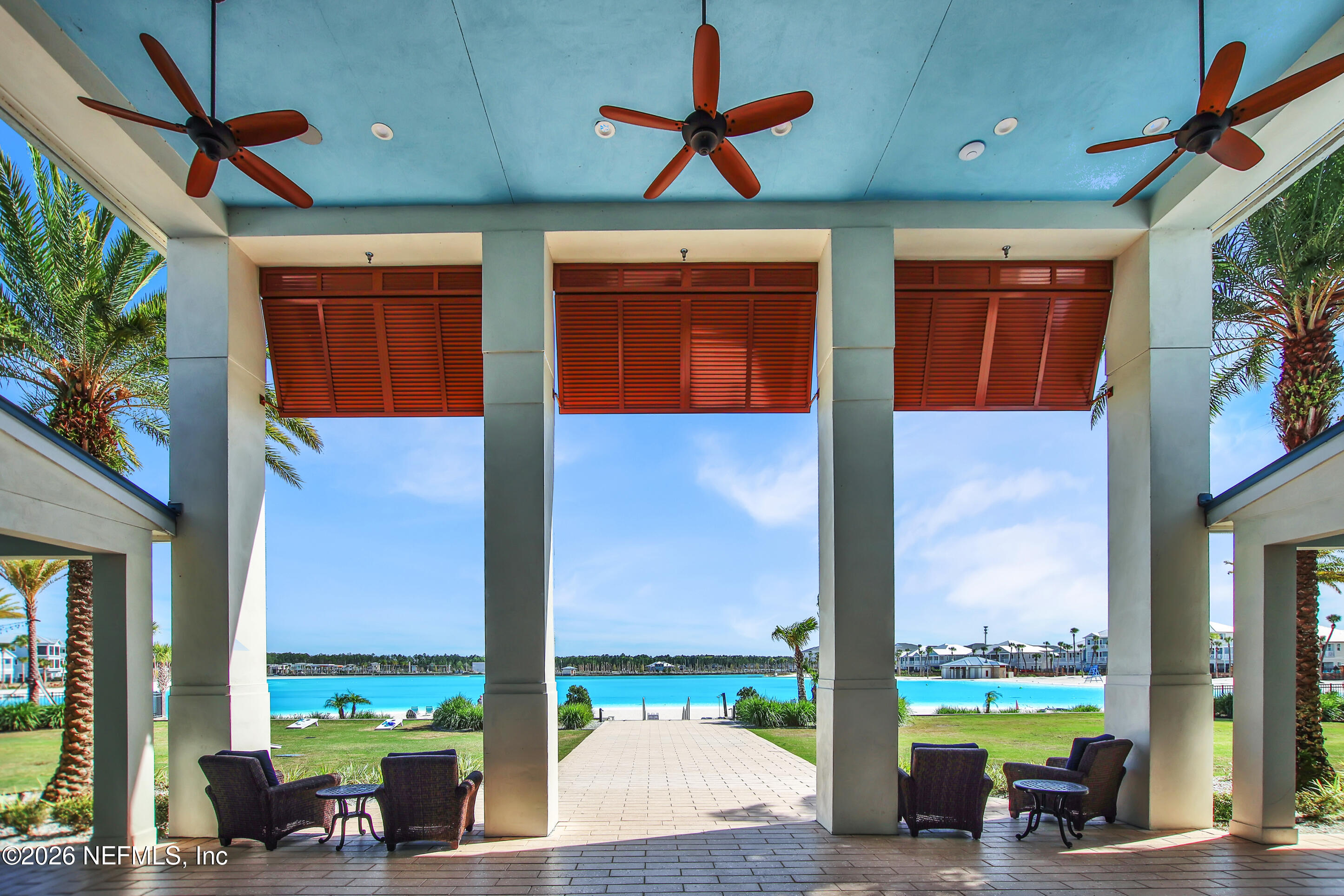 247 Rum Runner Way St. Johns, FL 32259 - Photo 32 of 42 a view of a patio with a table and chairs