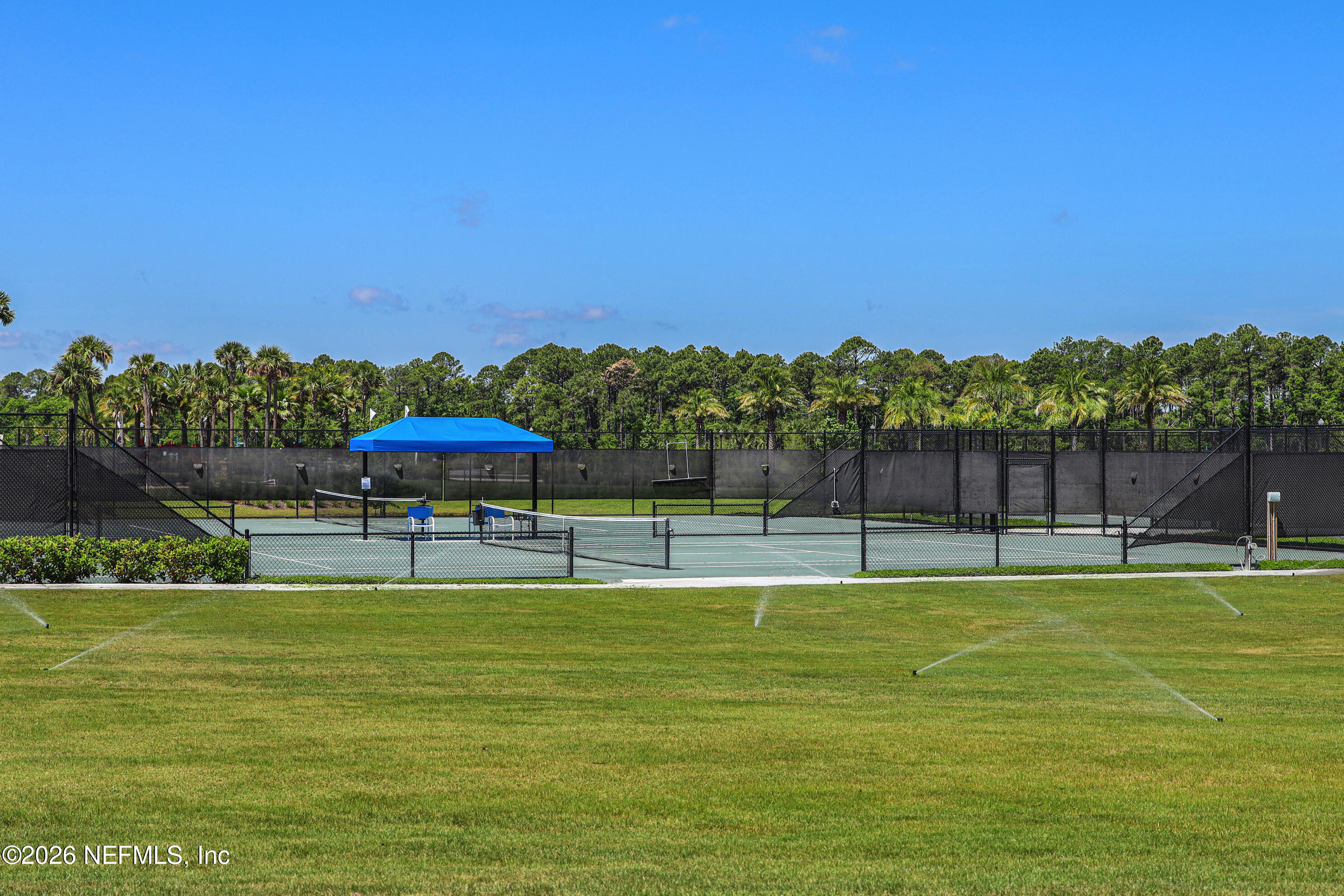 247 Rum Runner Way St. Johns, FL 32259 - Photo 37 of 42 a swimming pool with outdoor seating and yard