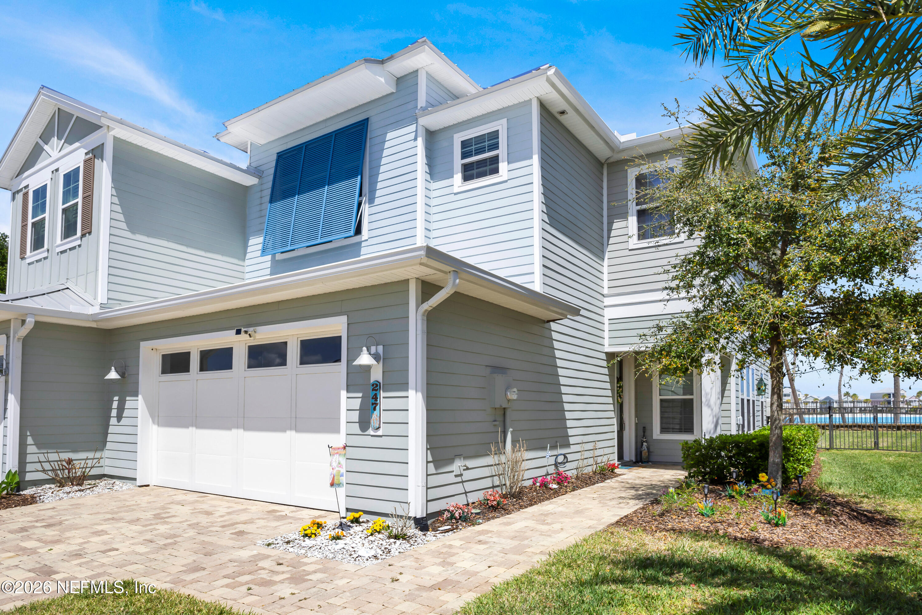 247 Rum Runner Way St. Johns, FL 32259 - Photo 41 of 42 a front view of a house with a yard and garage