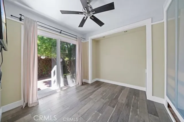 a bathroom with a tub sink toilet and shower
