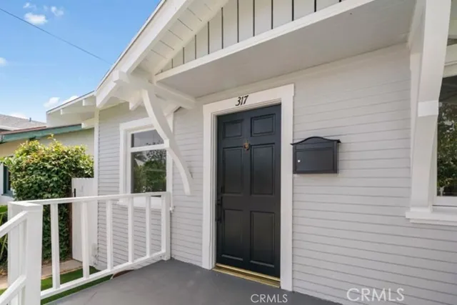 a view of front door and porch
