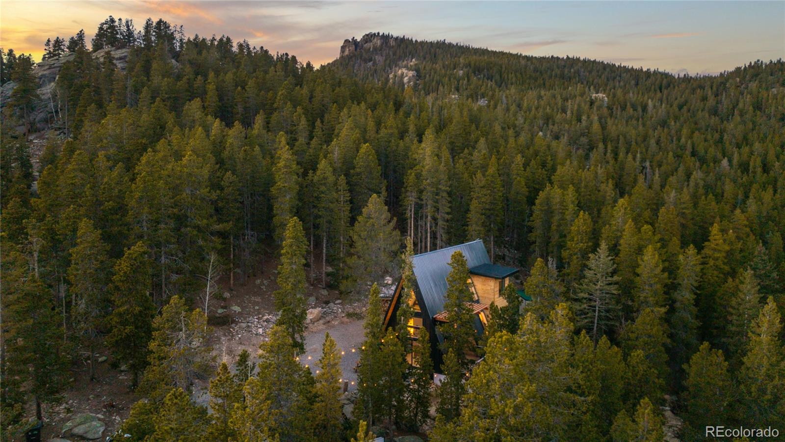 311 Pioneer Road Golden, CO 80403 - Photo 17 of 47 a view of a city with lush green forest