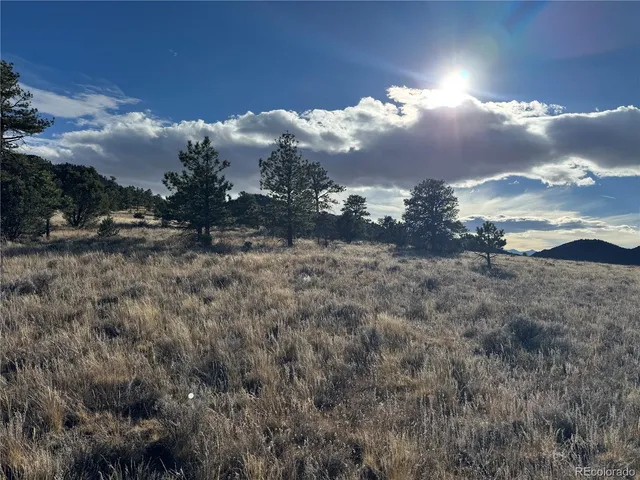 a view of mountain view with mountains in the background