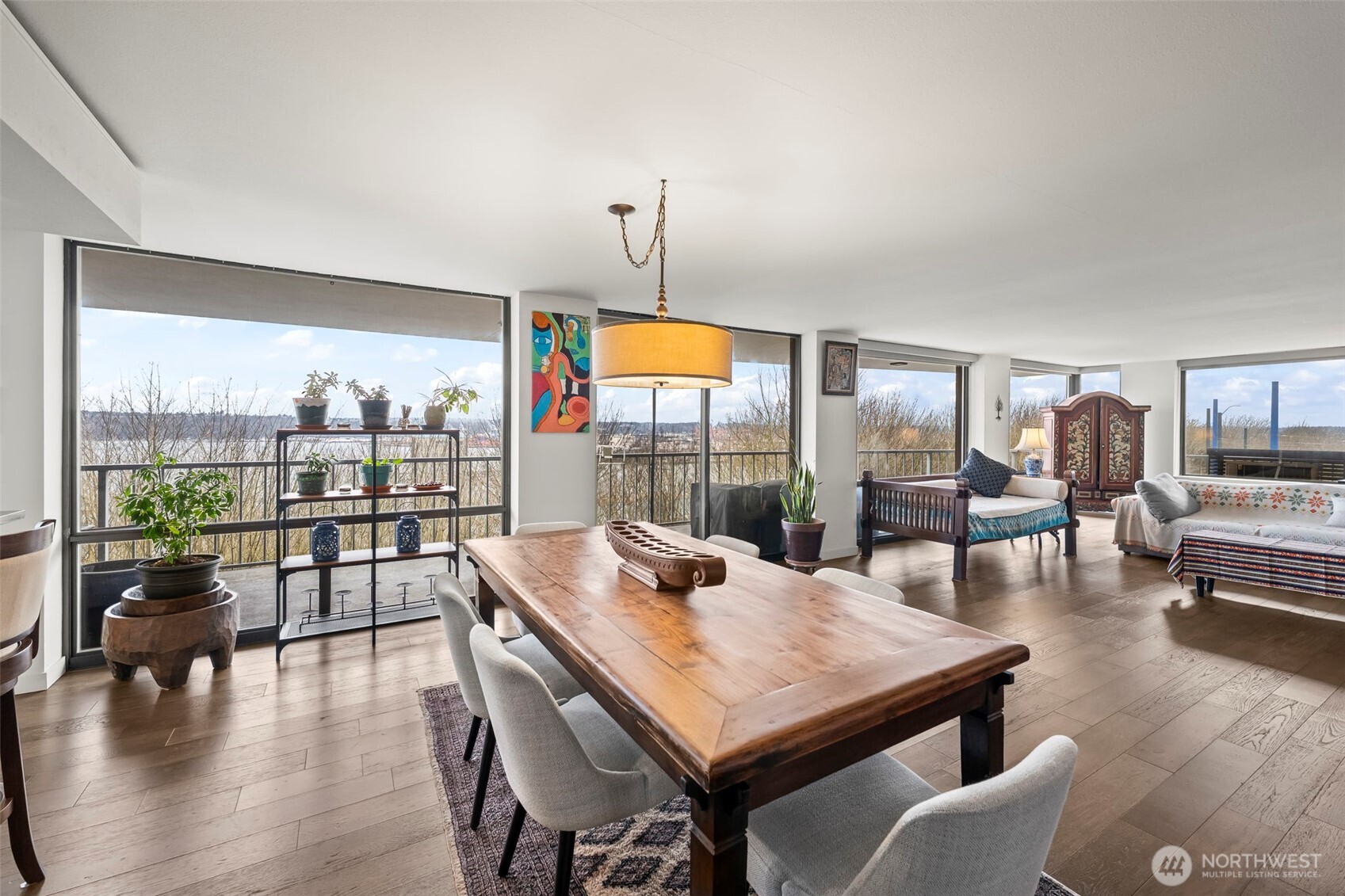 1 North Stadium Way, Unit 2 Tacoma, WA 98403 - Photo 12 of 40 a view of a dining room with furniture window and wooden floor