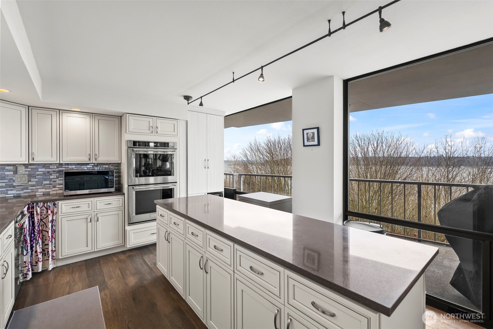 1 North Stadium Way, Unit 2 Tacoma, WA 98403 - Photo 16 of 40 a large white kitchen with a large window
