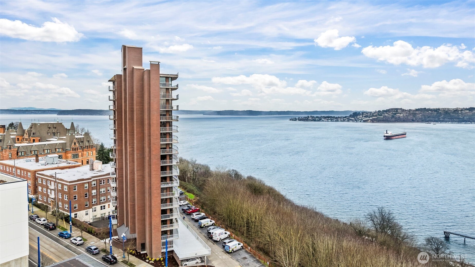 1 North Stadium Way, Unit 2 Tacoma, WA 98403 - Photo 2 of 40 a view of a lake with tall buildings