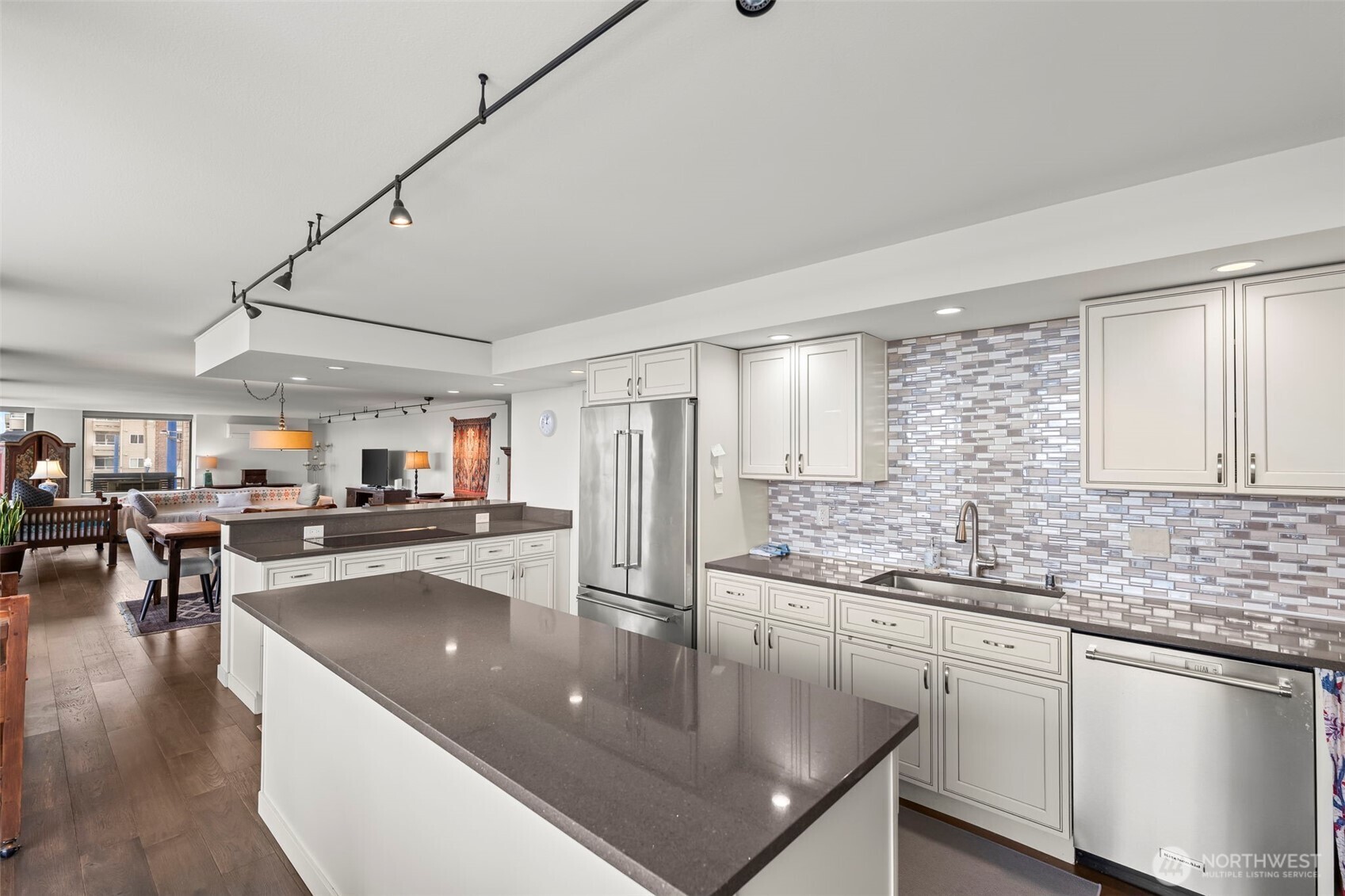 1 North Stadium Way, Unit 2 Tacoma, WA 98403 - Photo 21 of 40 a kitchen with stainless steel appliances granite countertop a sink a stove and cabinets