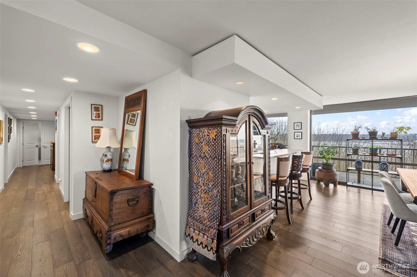 1 North Stadium Way, Unit 2 Tacoma, WA 98403 - Photo 23 of 40 a living room with furniture a rug and a floor to ceiling window