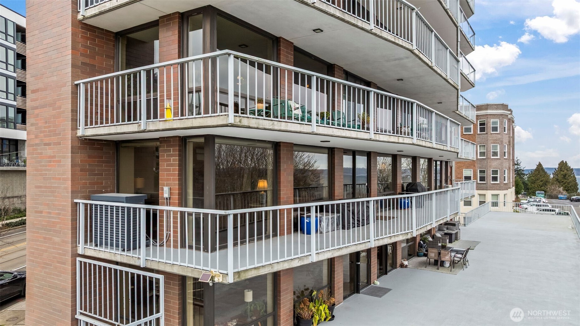 1 North Stadium Way, Unit 2 Tacoma, WA 98403 - Photo 3 of 40 a view of a house with a wooden deck