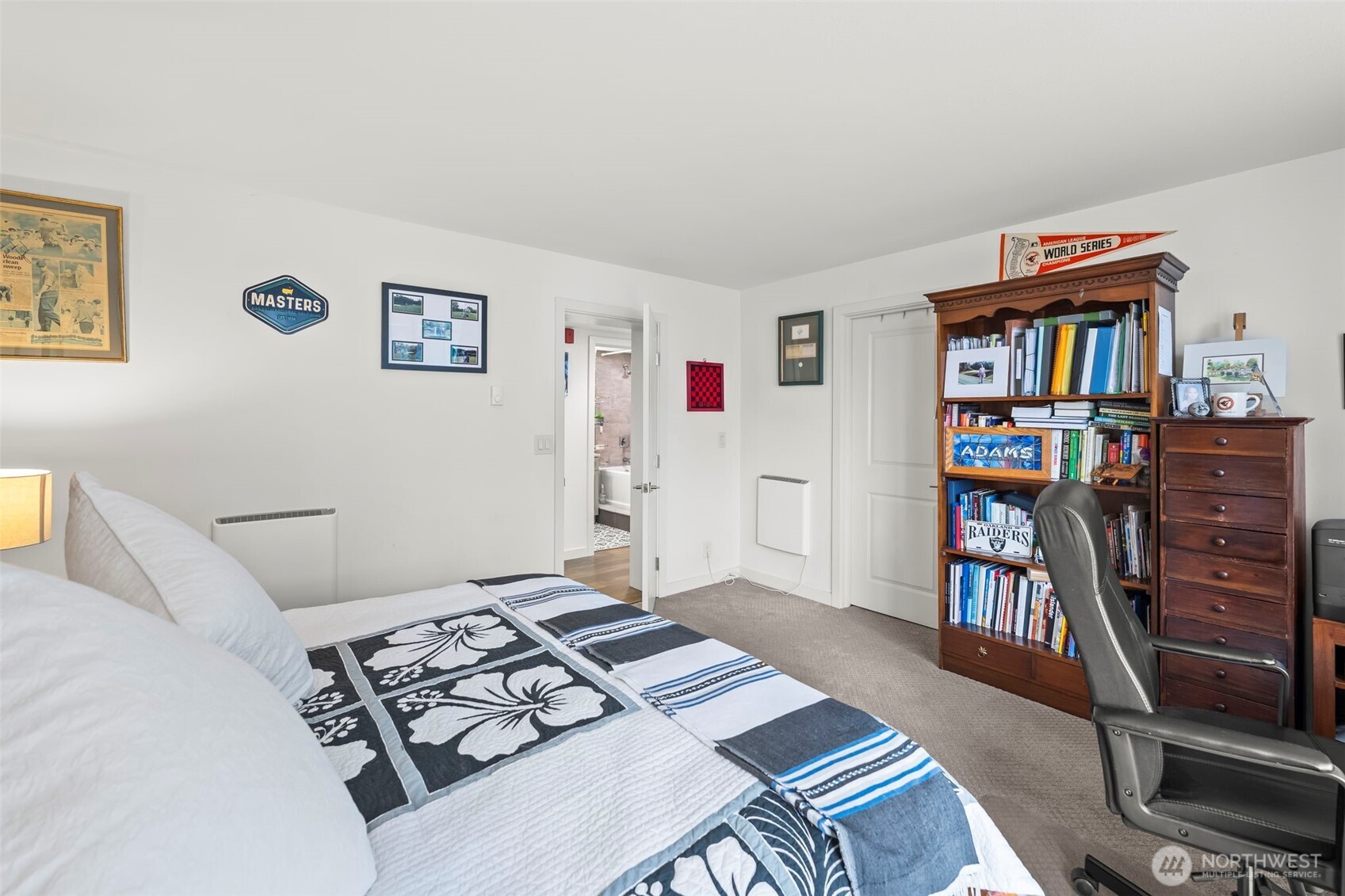 1 North Stadium Way, Unit 2 Tacoma, WA 98403 - Photo 31 of 40 a bedroom with furniture and a book shelf