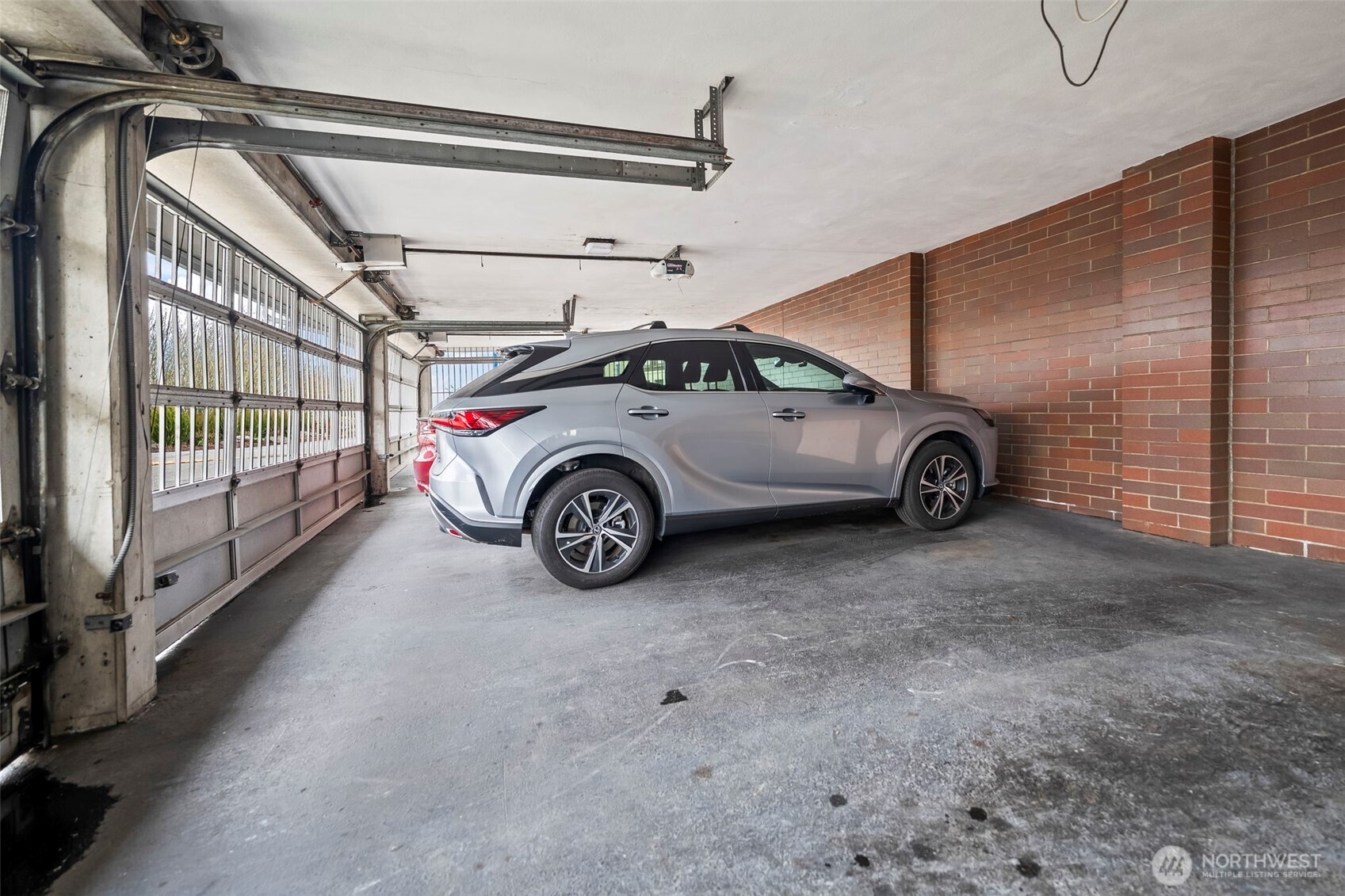 1 North Stadium Way, Unit 2 Tacoma, WA 98403 - Photo 39 of 40 a view of a car in garage