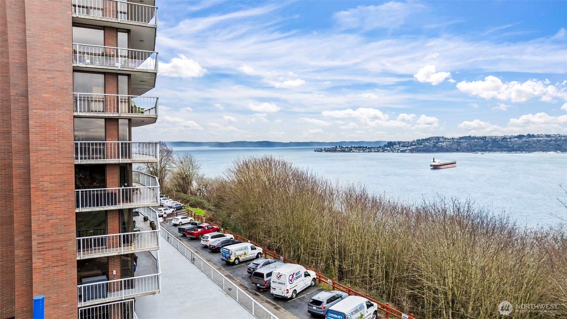 1 North Stadium Way, Unit 2 Tacoma, WA 98403 - Photo 5 of 40 a view of a lake with tall building