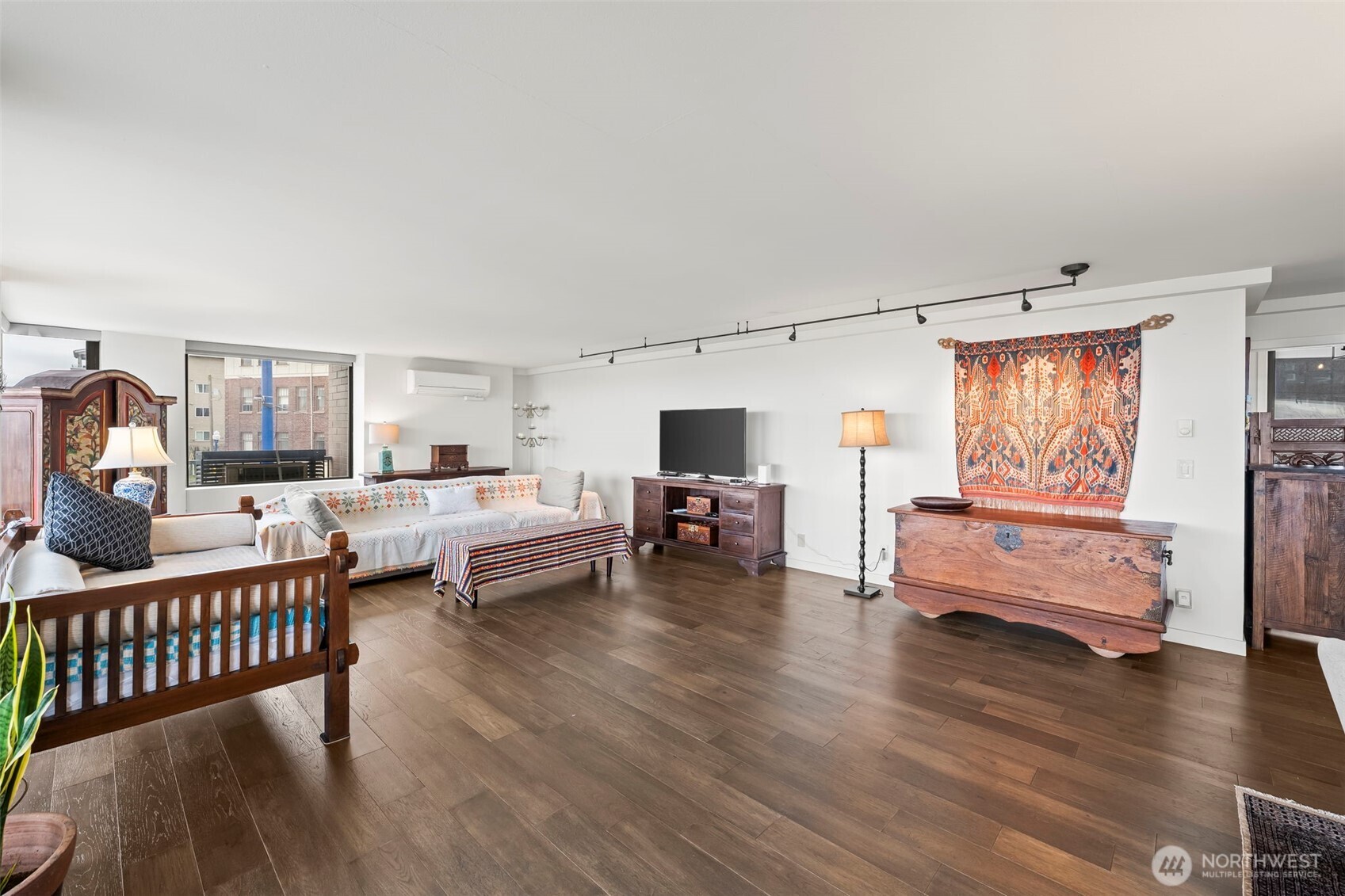 1 North Stadium Way, Unit 2 Tacoma, WA 98403 - Photo 7 of 40 a bedroom with furniture and wooden floor