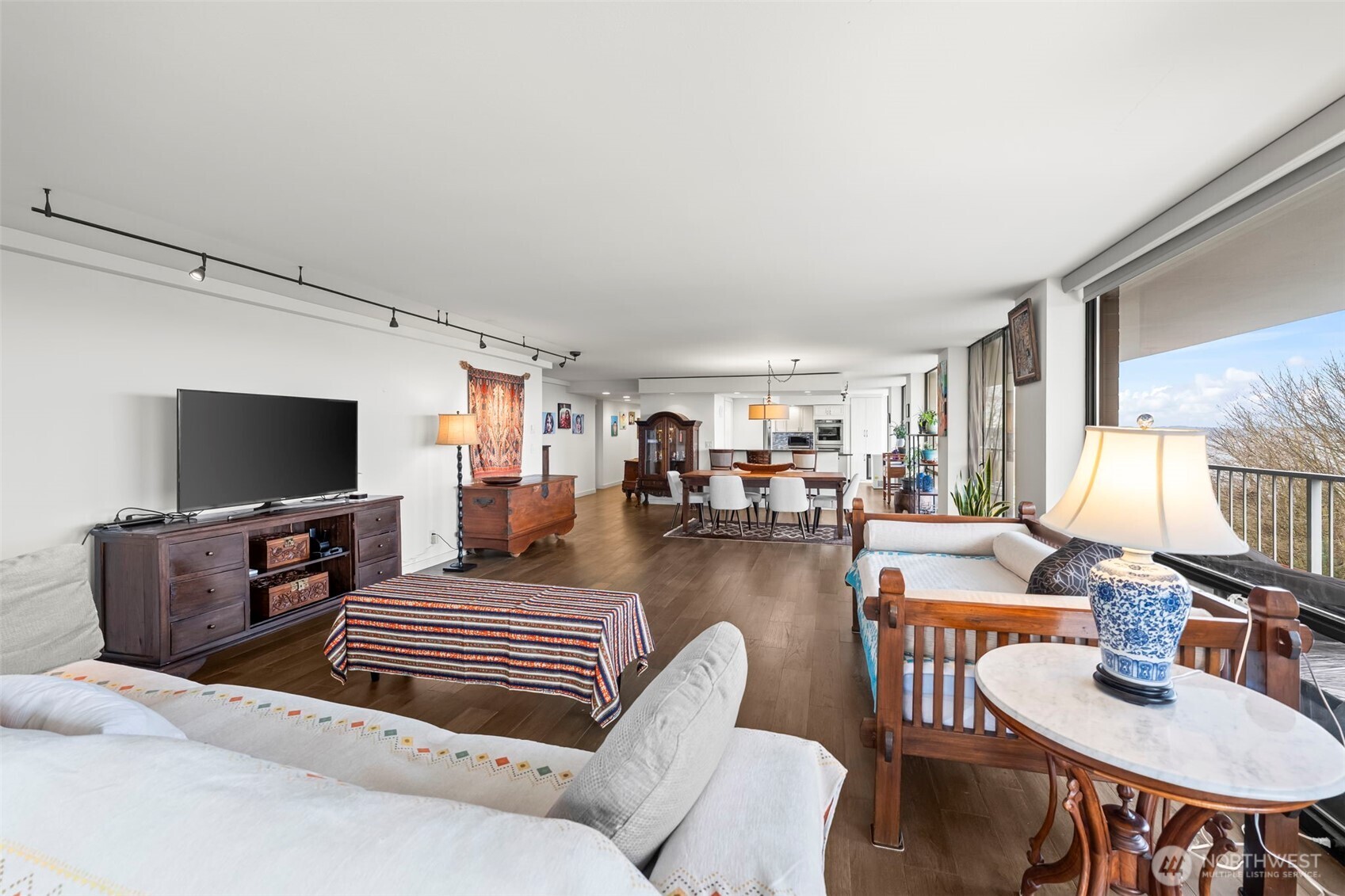 1 North Stadium Way, Unit 2 Tacoma, WA 98403 - Photo 8 of 40 a living room with furniture and a flat screen tv