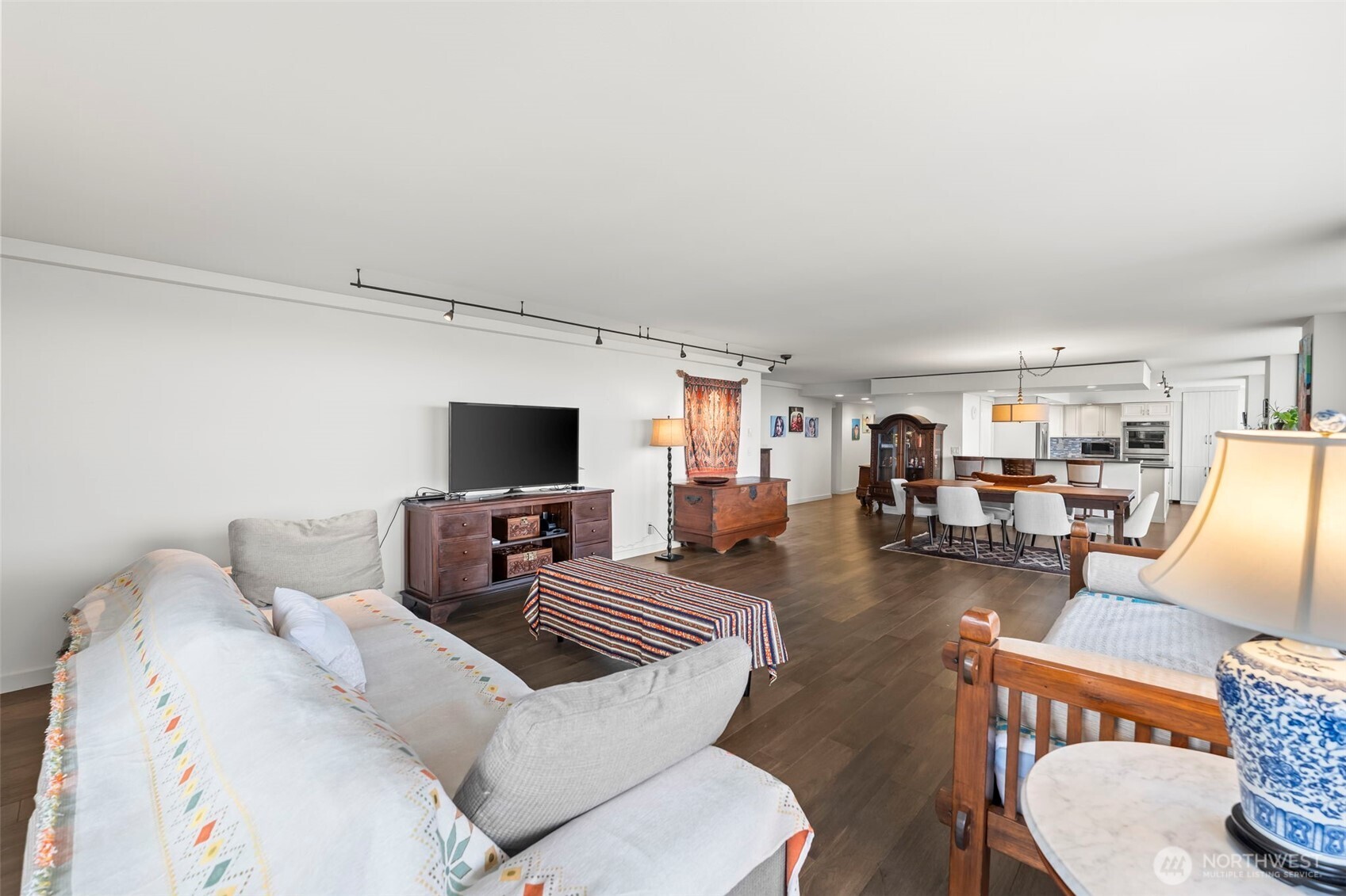 1 North Stadium Way, Unit 2 Tacoma, WA 98403 - Photo 9 of 40 a living room with furniture and a flat screen tv