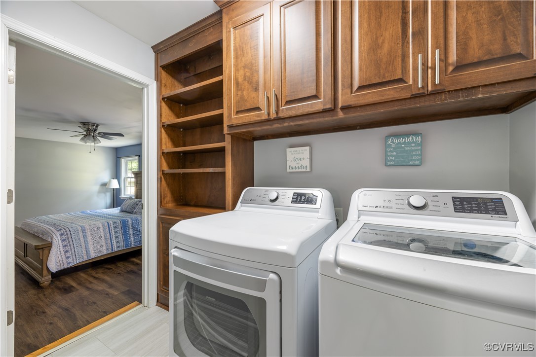 16701 Jolly Road Disputanta, VA 23842 - Photo 19 of 49 Laundry area featuring washing machine and clothes