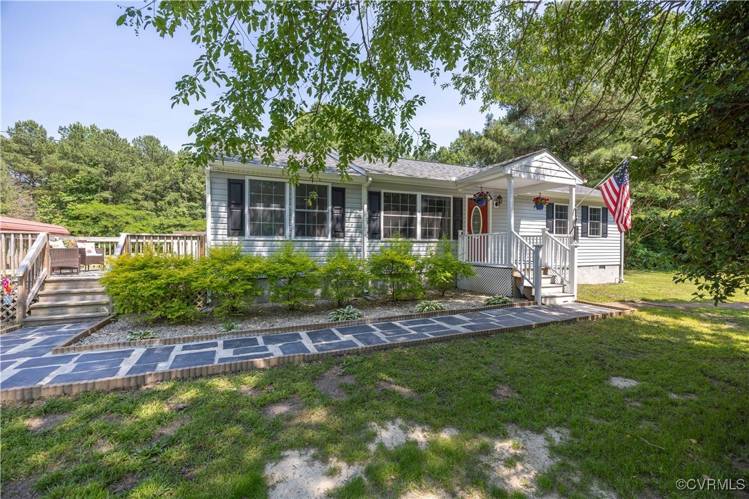 16701 Jolly Road Disputanta, VA 23842 - Photo 2 of 49 View of front facade with side deck onto sun porch