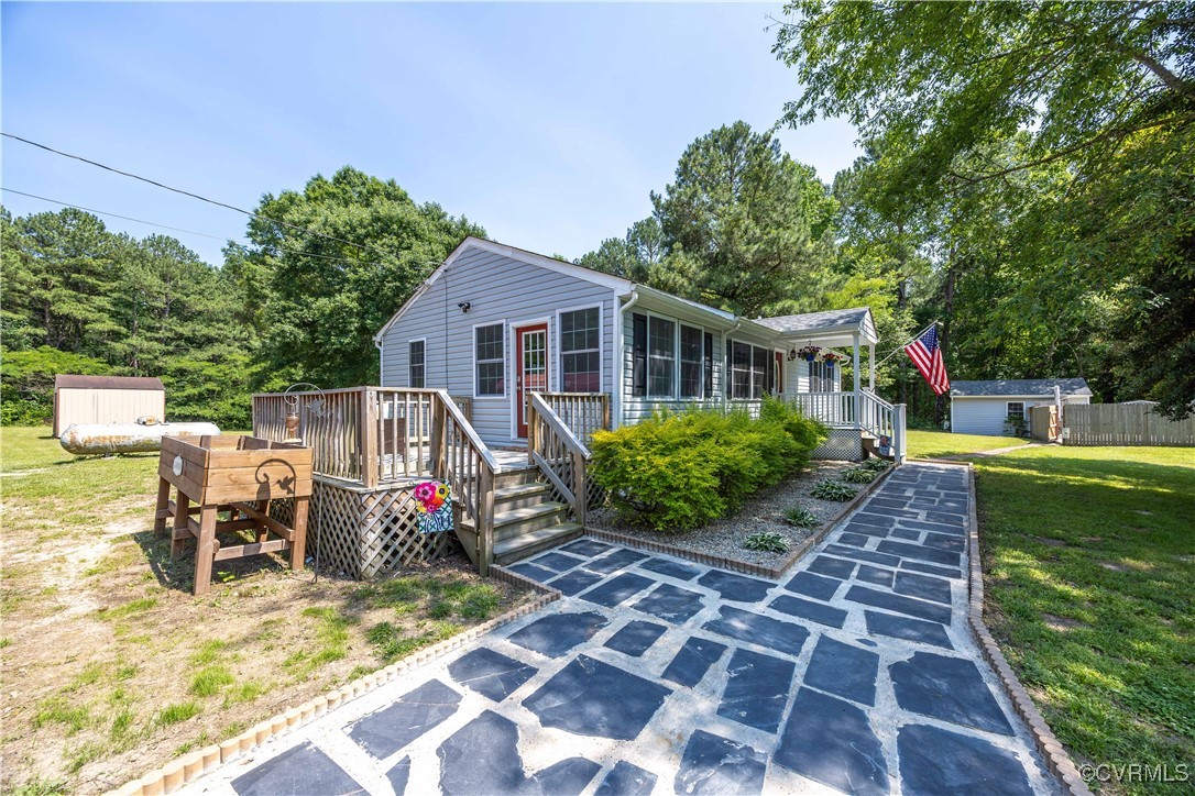 16701 Jolly Road Disputanta, VA 23842 - Photo 5 of 49 View of front of property and side wooden deck