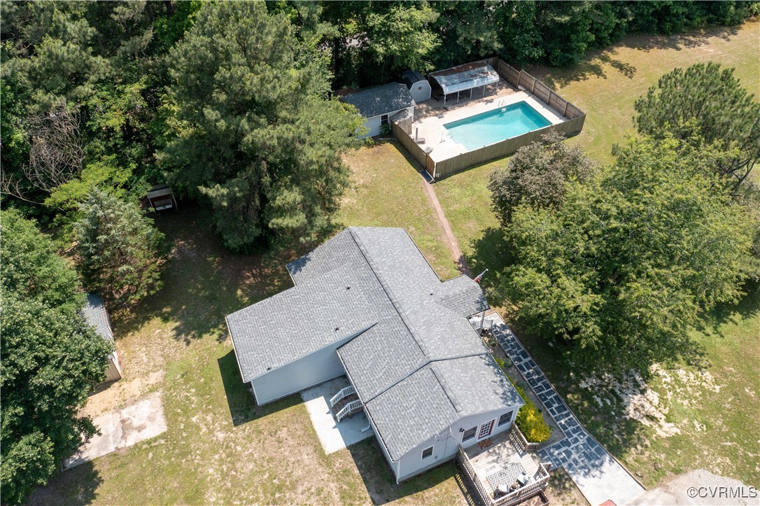 16701 Jolly Road Disputanta, VA 23842 - Photo 6 of 49 View from above of property featuring a pool area