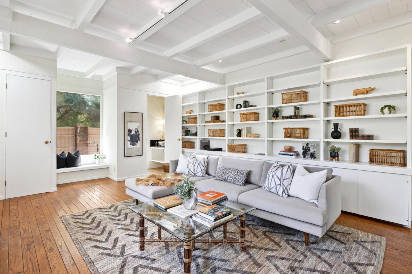 19 Ring Lane Carmel Valley, CA 93924 - Photo 19 of 60 a living room with furniture and a book shelf