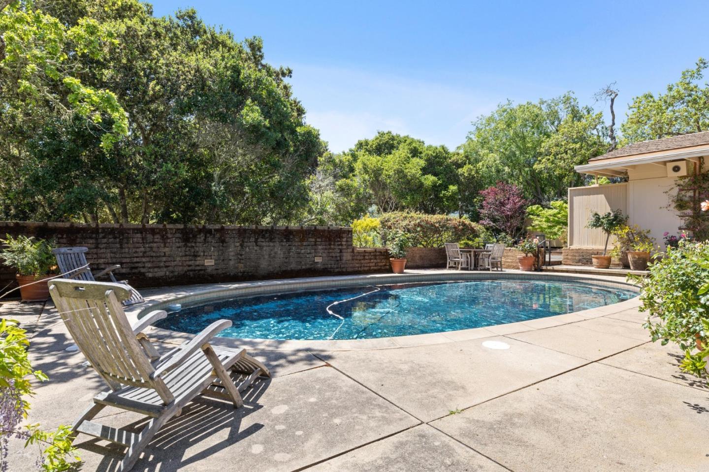 19 Ring Lane Carmel Valley, CA 93924 - Photo 47 of 60 a view of backyard with outdoor seating and plants