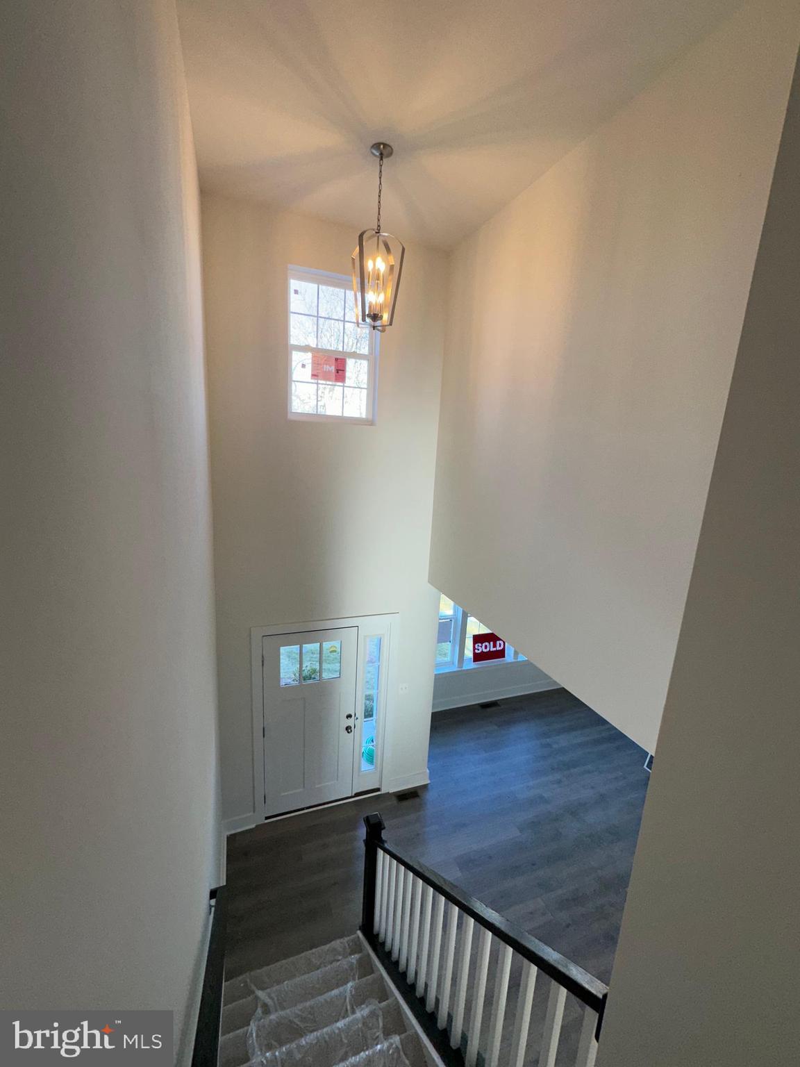 King Avenue Rosedale, MD 21237 - Photo 22 of 29 a view of a hallway with wooden floor and staircase