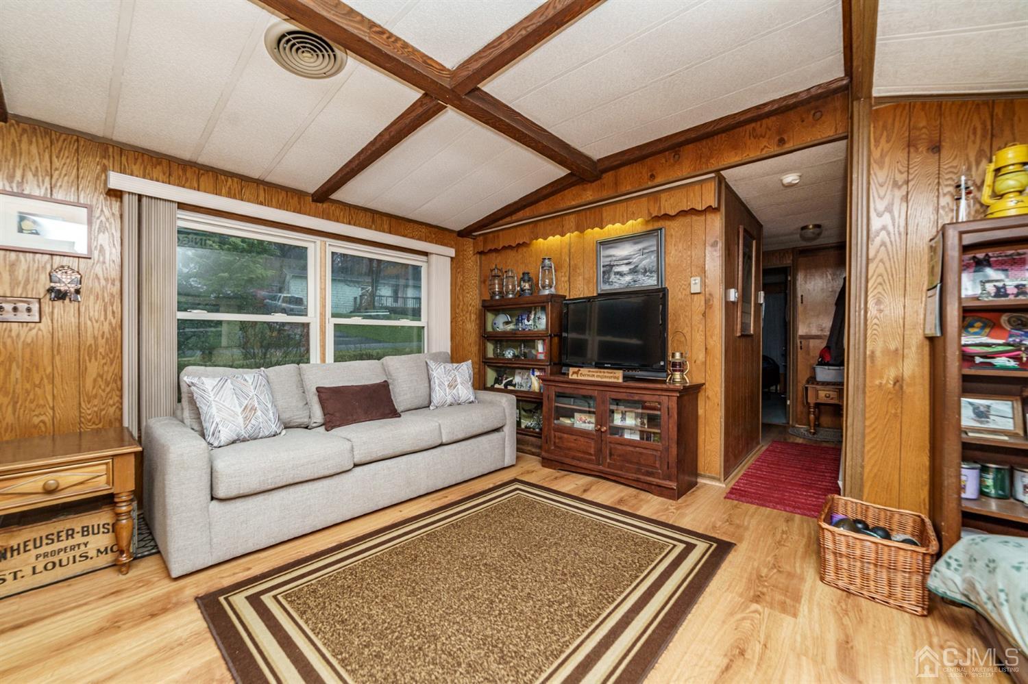 4 Timbercroft Road High Bridge, NJ 08829 - Photo 4 of 23 a living room with furniture and a flat screen tv