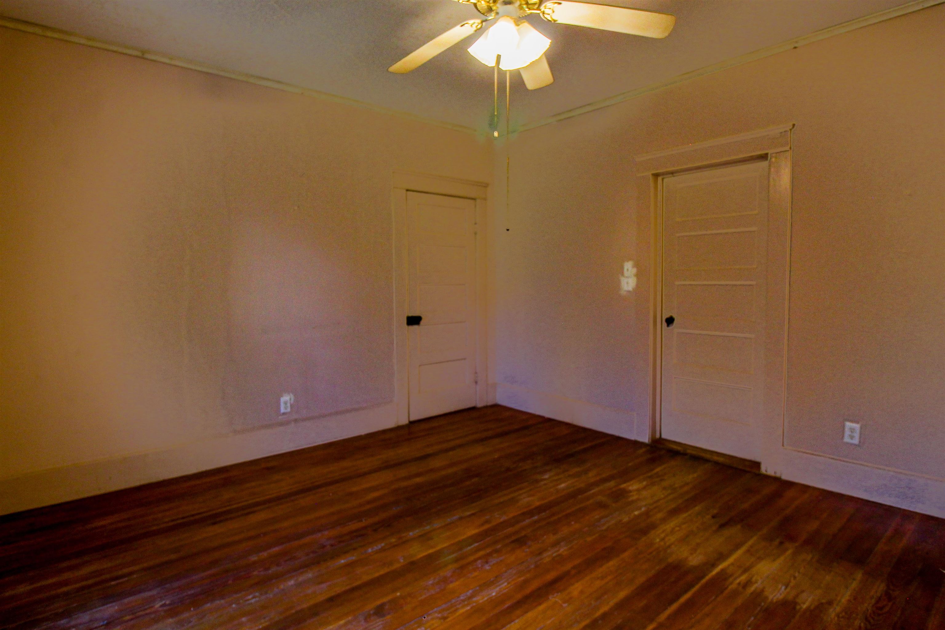 2440 Edith-Nankipoo Road Ripley, TN 38063 - Photo 13 of 27 Bedroom featuring original hardwood floors