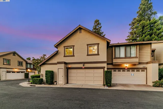 a view of a house with a garage