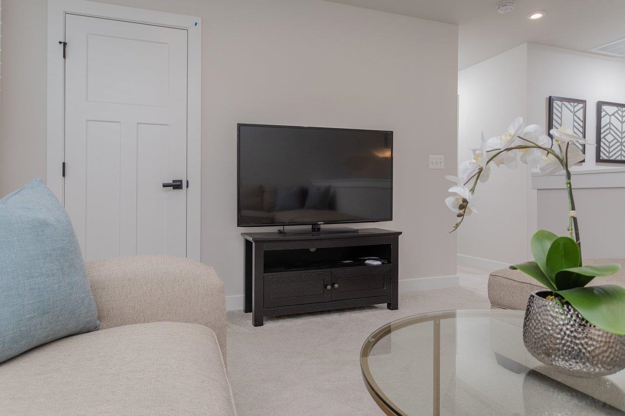 2754 Rdg Hvn Drive Harrisonburg, VA 22801 - Photo 30 of 64 a living room with furniture and a flat screen tv