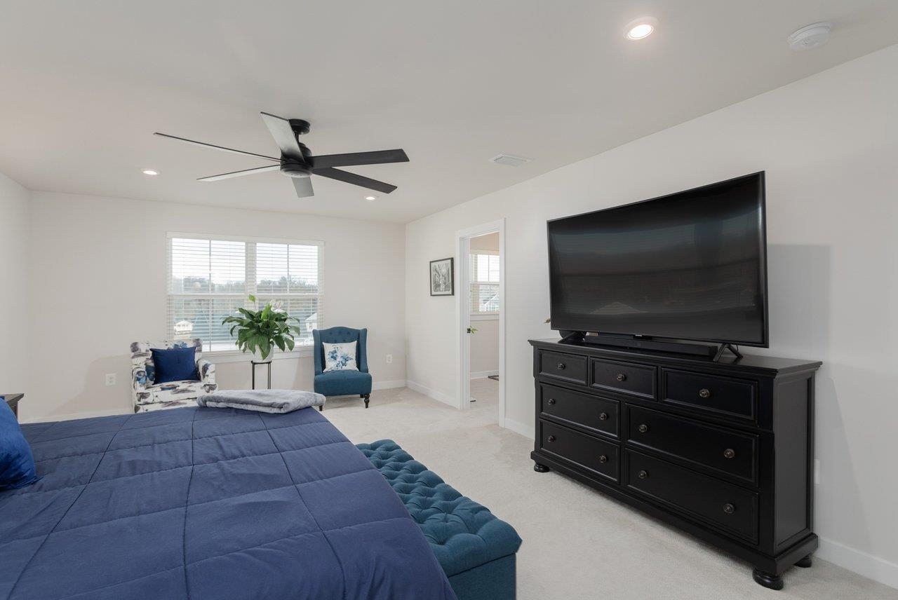 2754 Rdg Hvn Drive Harrisonburg, VA 22801 - Photo 32 of 64 a living room with furniture and a flat screen tv