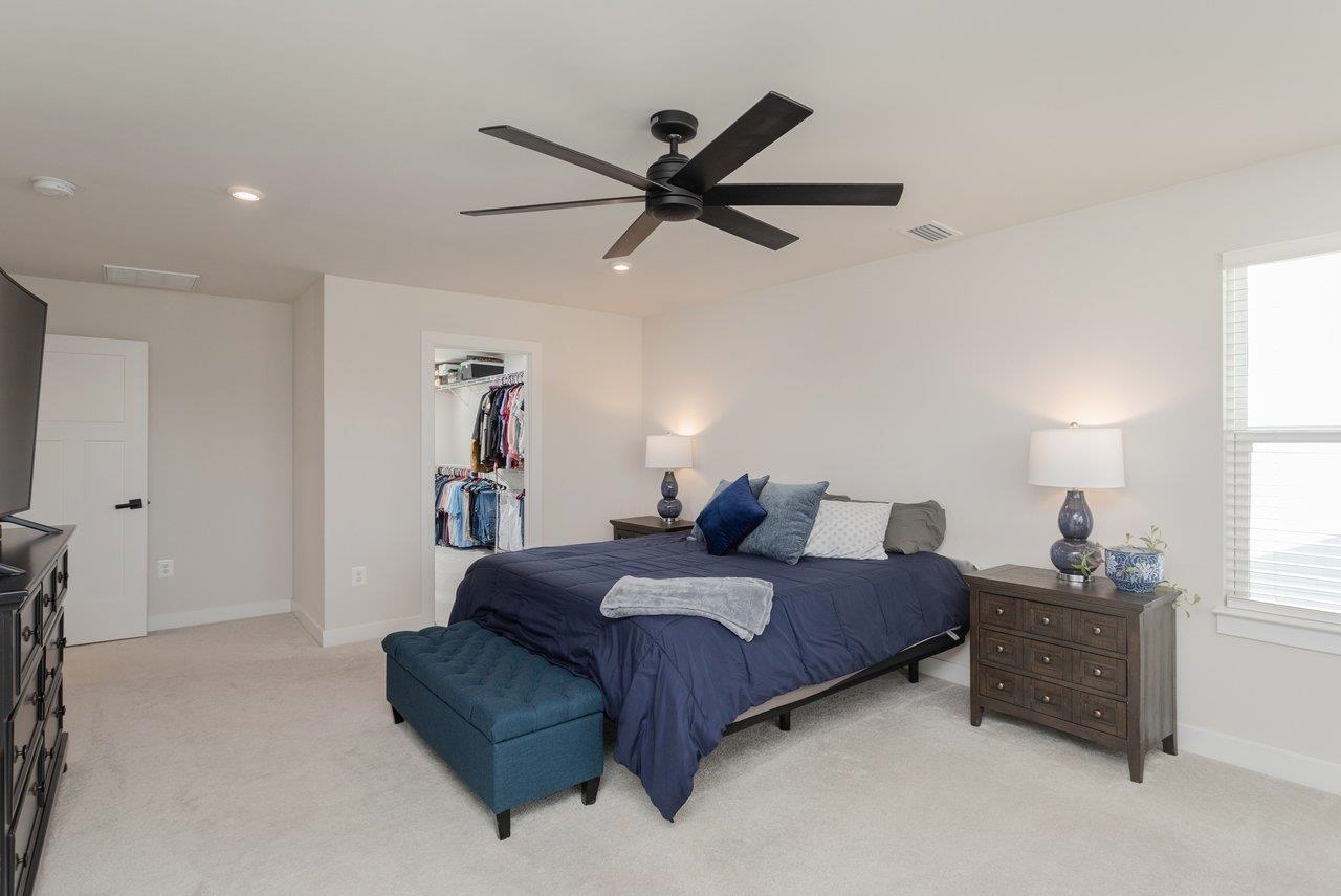 2754 Rdg Hvn Drive Harrisonburg, VA 22801 - Photo 34 of 64 a spacious bedroom with a bed a window and closet