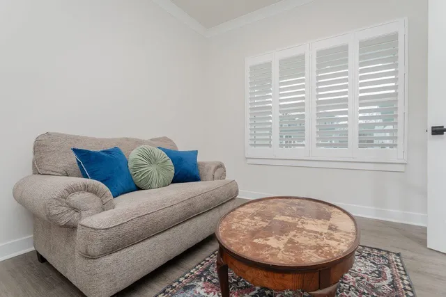 a living room with furniture and a window