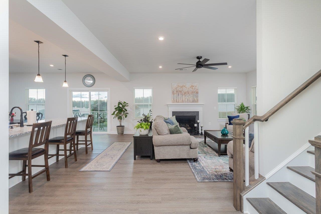 2754 Rdg Hvn Drive Harrisonburg, VA 22801 - Photo 9 of 64 a living room with furniture kitchen view and a chandelier