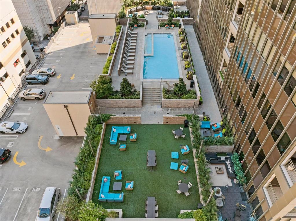 1200 Main Street, Unit 408 Dallas, TX 75202 - Photo 3 of 5 an aerial view of a residential houses with outdoor space