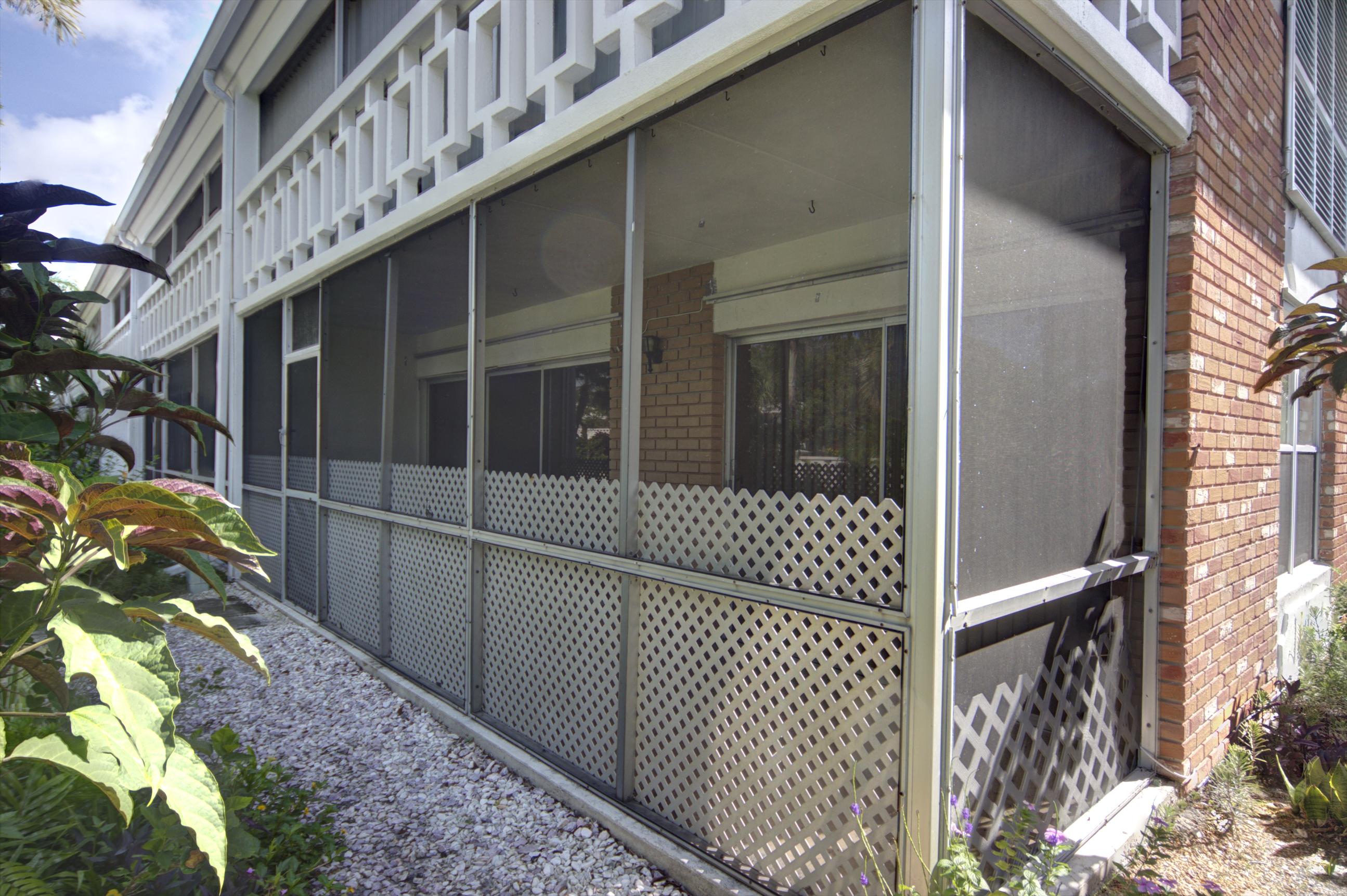 91 Willow Road, Unit 101 Tequesta, FL 33469 - Photo 8 of 9 patio exterior