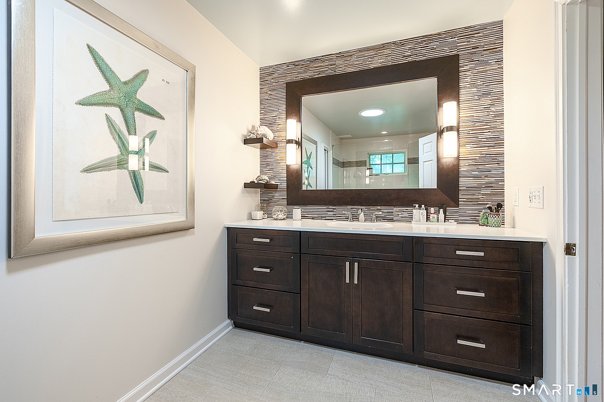 33 Hunter Lane Ridgefield, CT 06877 - Photo 24 of 39 a bathroom with a double vanity sink and a mirror