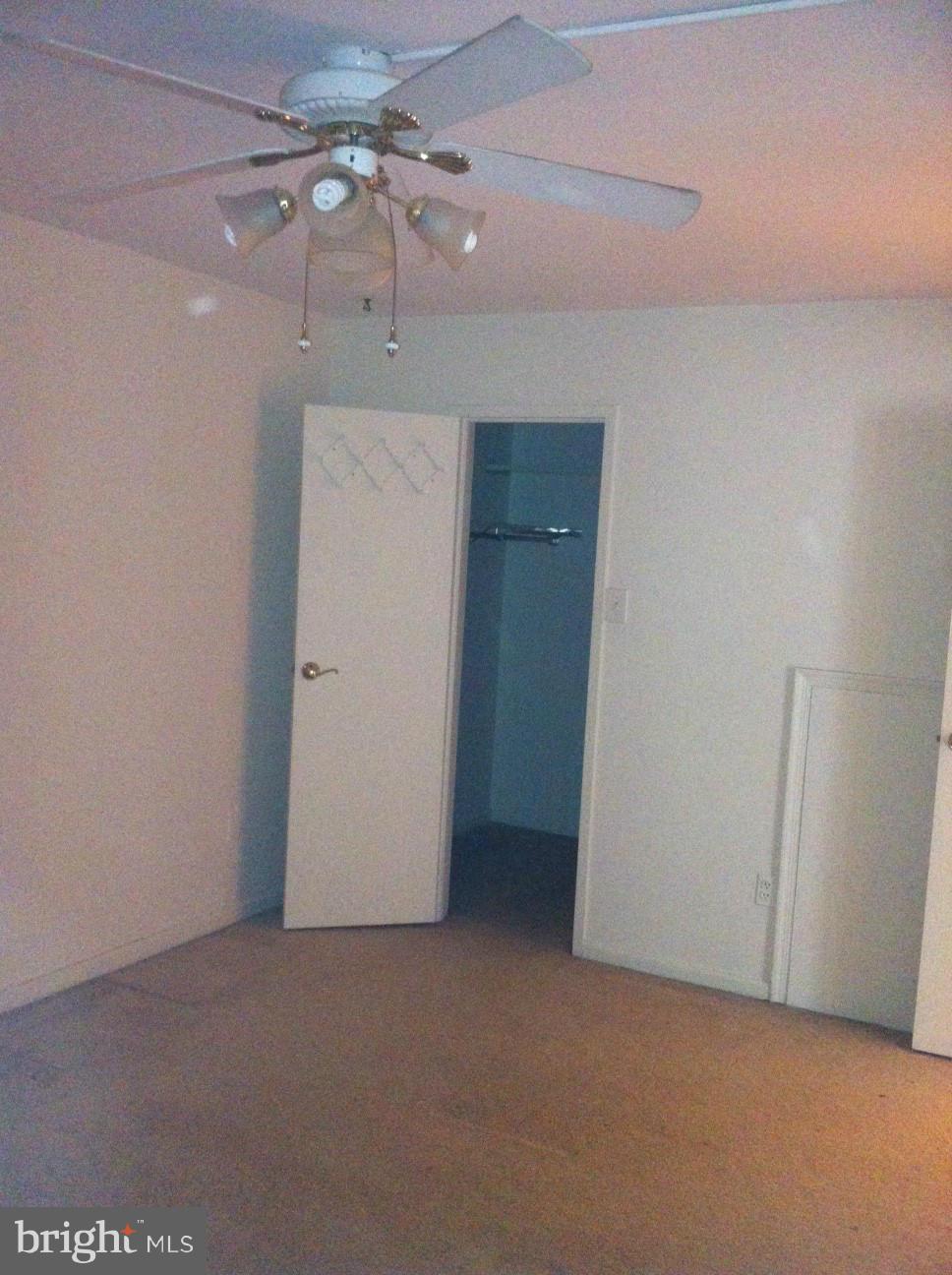 6147 Edsall Road, Unit H Alexandria, VA 22304 - Photo 12 of 13 a view of a chandelier fan in a room