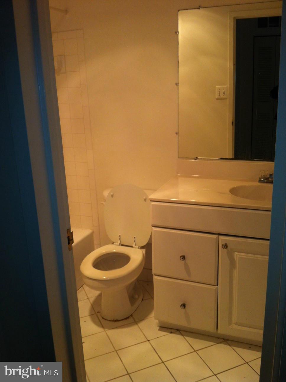 6147 Edsall Road, Unit H Alexandria, VA 22304 - Photo 8 of 13 a bathroom with a sink and a toilet