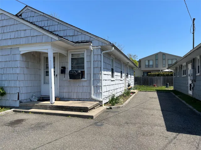 a view of a house with a street