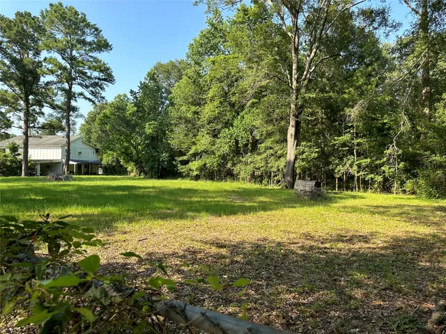 a view of a golf course with a lake