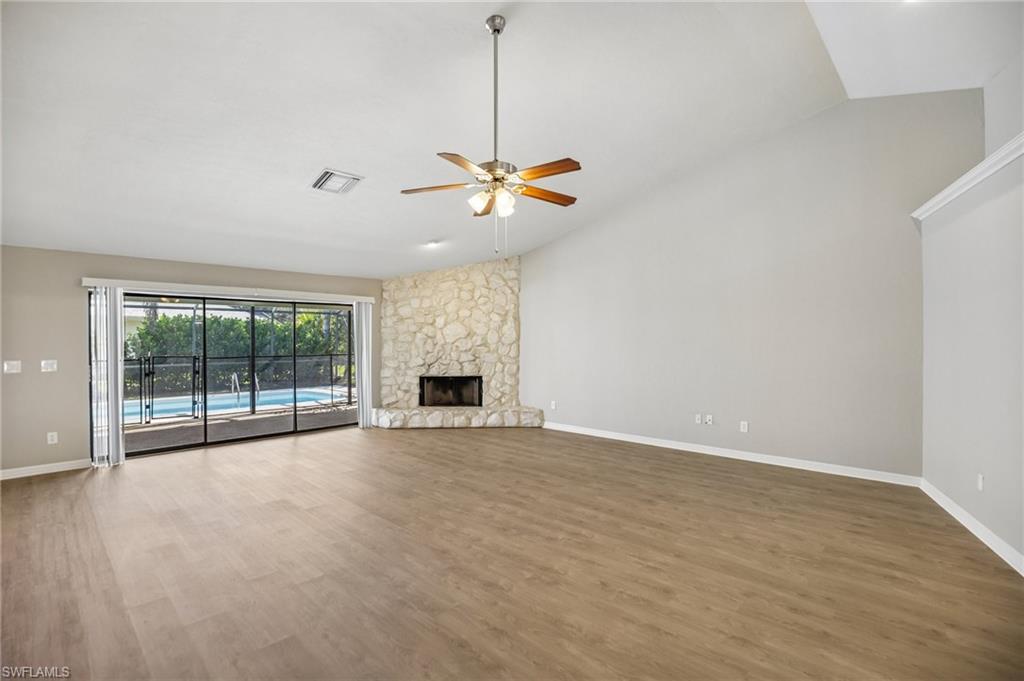 1937 Princess Court Naples, FL 34110 - Photo 12 of 42 a view of an empty room with a window