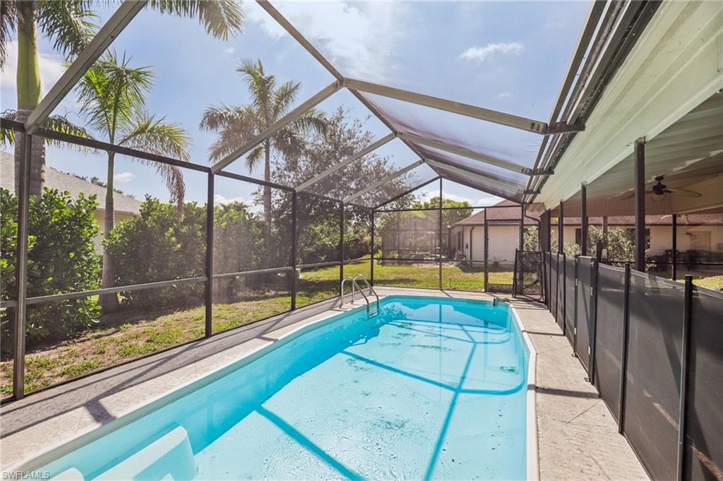 1937 Princess Court Naples, FL 34110 - Photo 37 of 42 a view of a swimming pool with a porch