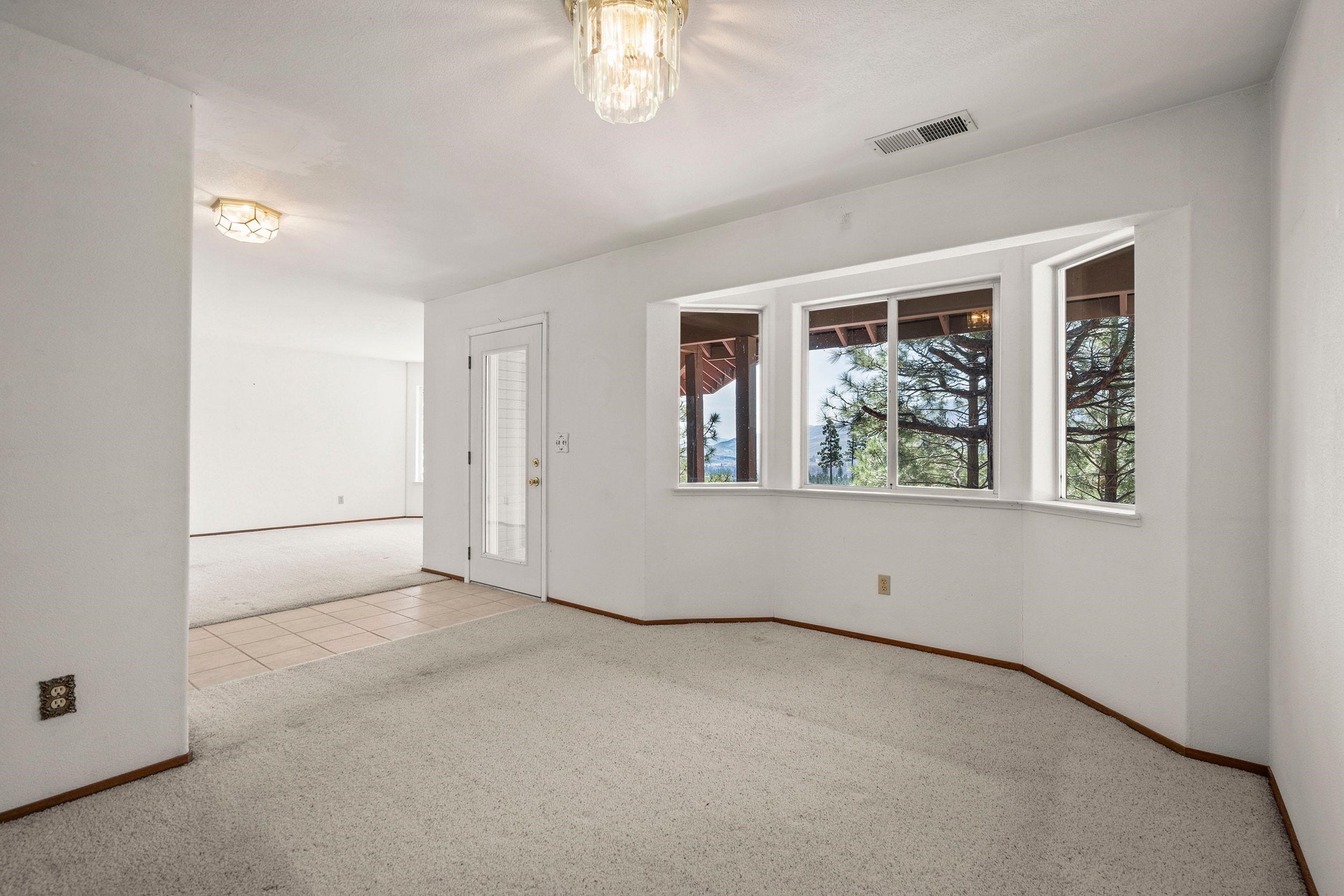 1020 Sunrise Creek Road Loyalton, CA 96118 - Photo 14 of 27 an empty room with windows