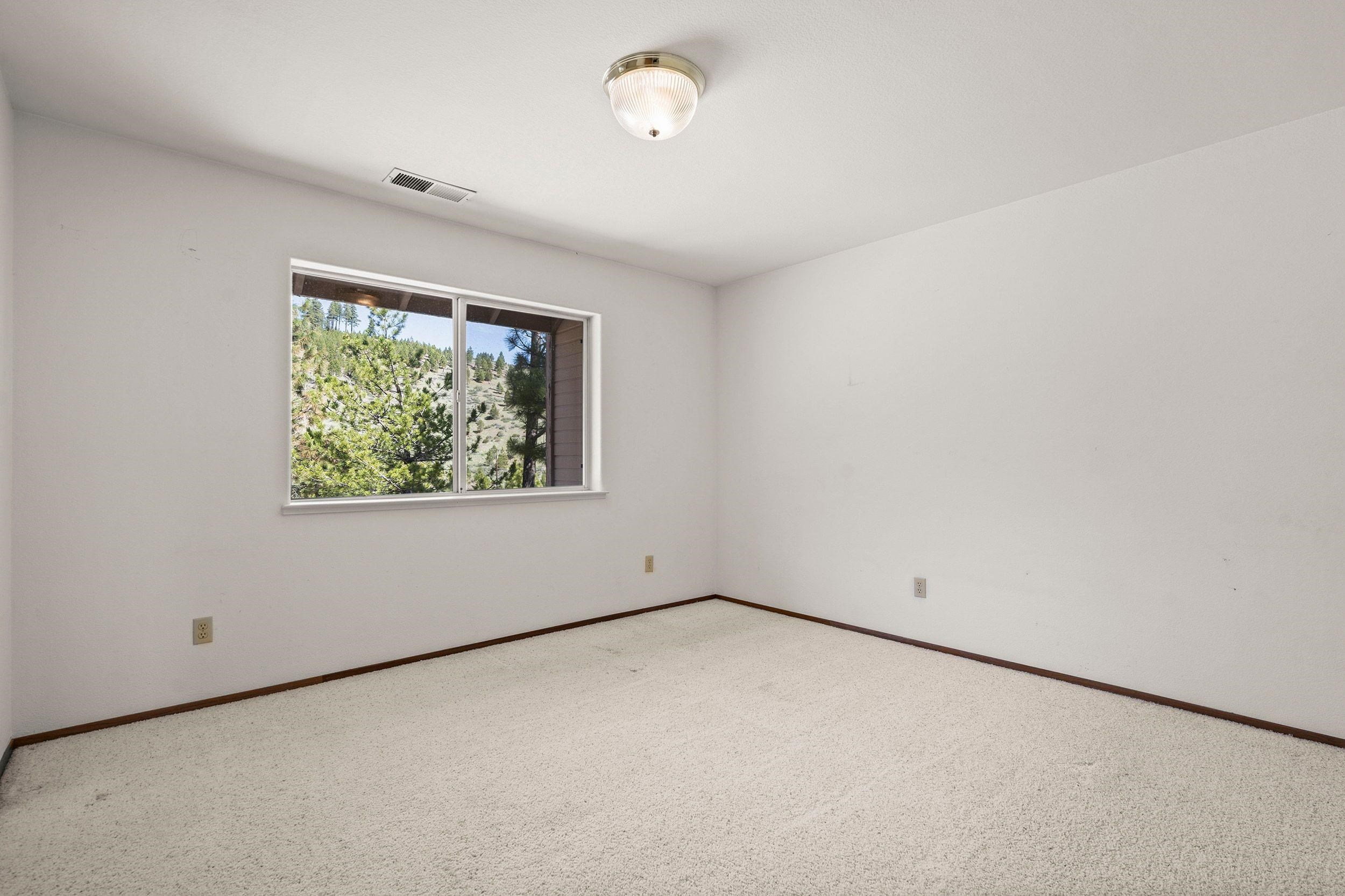 1020 Sunrise Creek Road Loyalton, CA 96118 - Photo 22 of 27 an empty room with a window