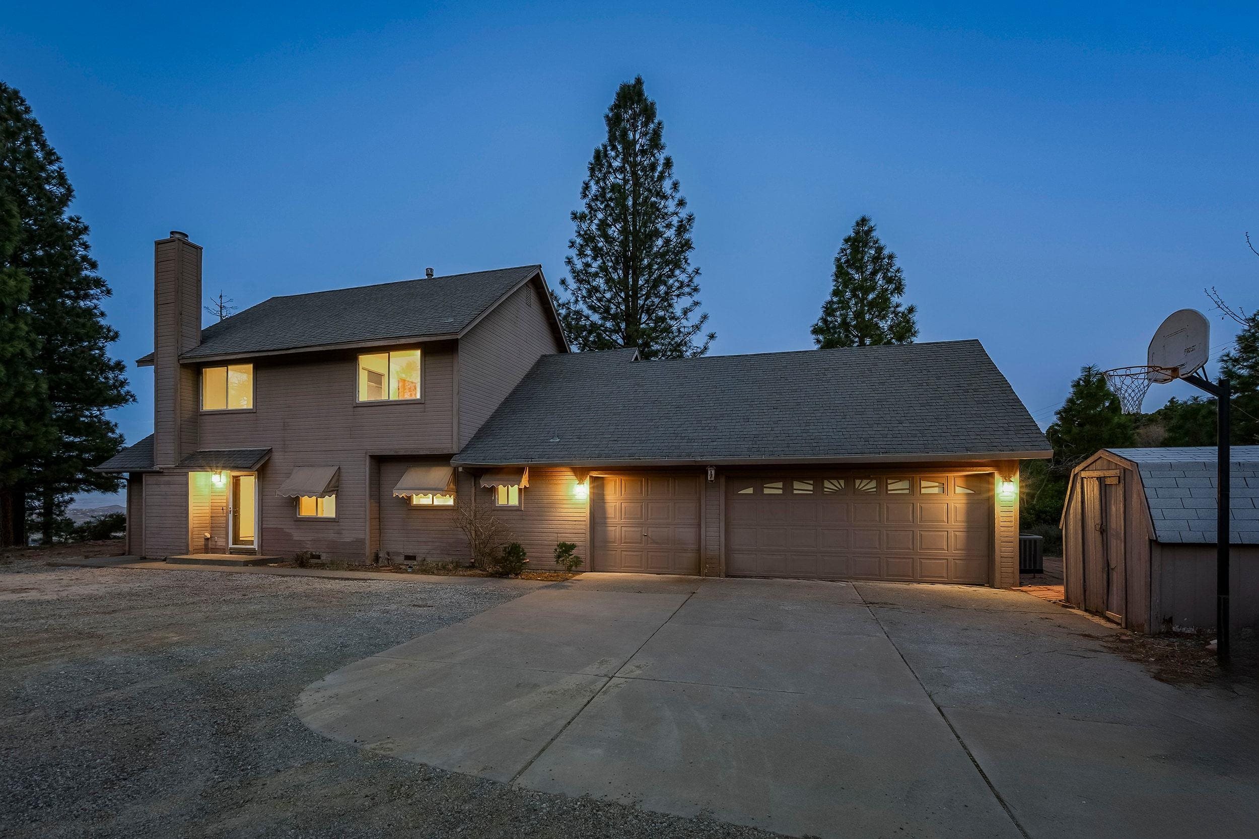 1020 Sunrise Creek Road Loyalton, CA 96118 - Photo 5 of 27 a front view of a house with a yard