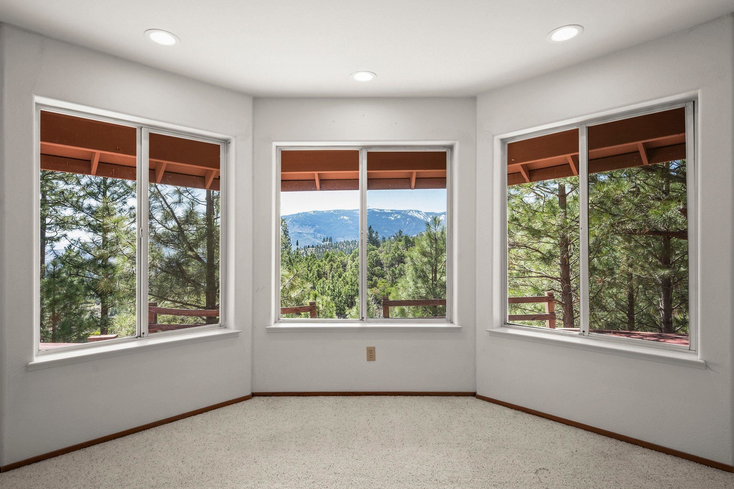 1020 Sunrise Creek Road Loyalton, CA 96118 - Photo 7 of 27 a view of an empty room with a window